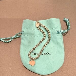 "Return to Tiffany" Tiffany & Co. Silver Bead Bracelet with Pink Heart Charm